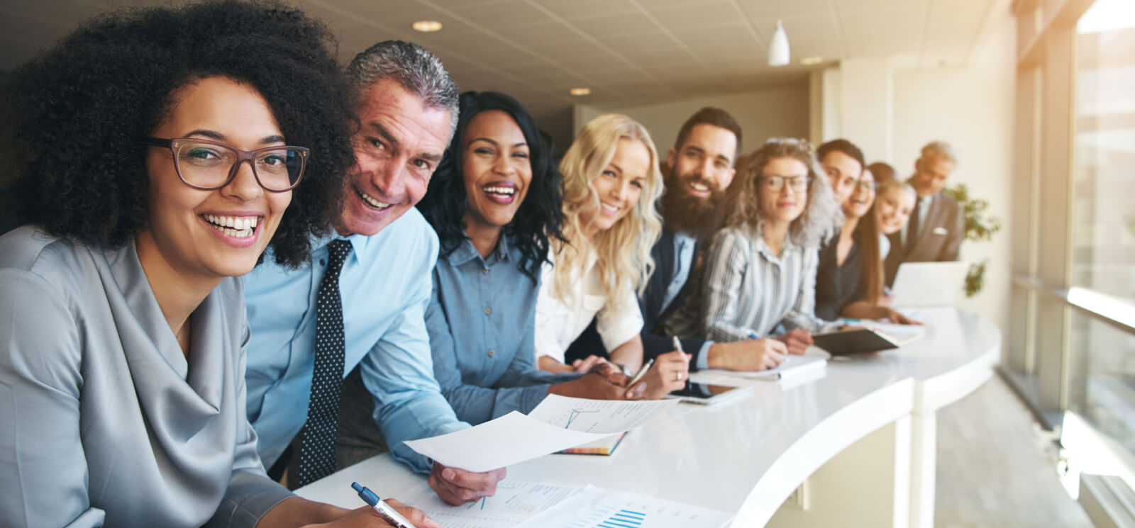 group of diverse coworkers looking at the camera